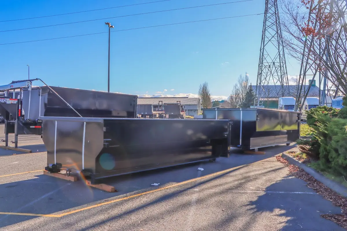 Roll-off dumpster ready for waste disposal at job site for Demolition Dumpster Rental in Concord